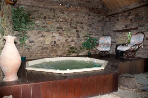 Hot tub set in the barn