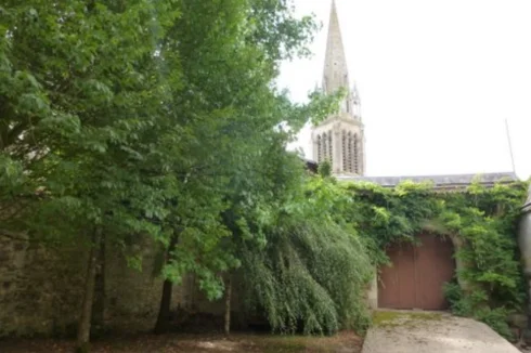 Garden & church to the rear