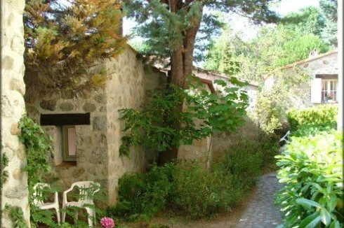 Catalan village style in pure hand cut granite stone