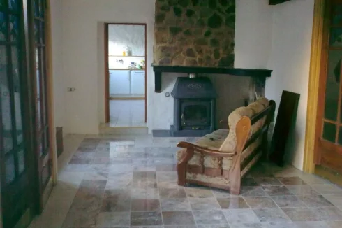 Sitting Room with Woodburner through to Kitchen