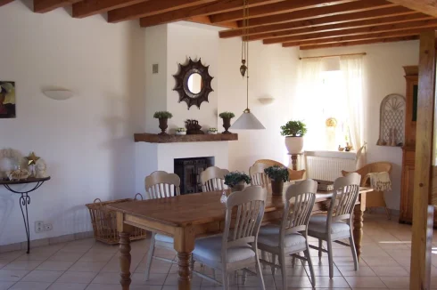 Dining table by the fireplace