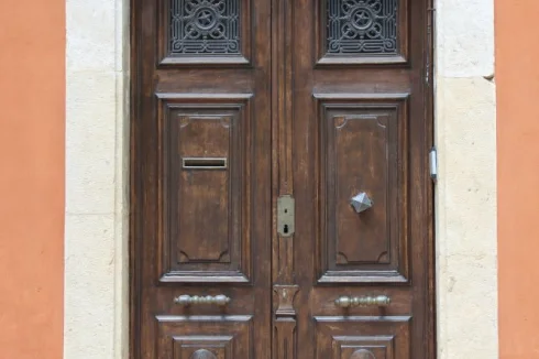 The front door - noble, majestic, with solid brass fittings.