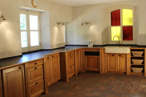 The kitchen looks on to the courtyard and has room enough for 10 to prepare meals together