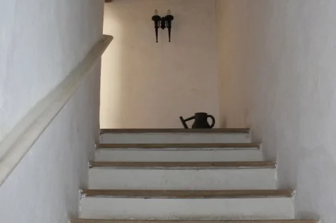 Stairs leading from the first floor landing to the top floor bedrooms