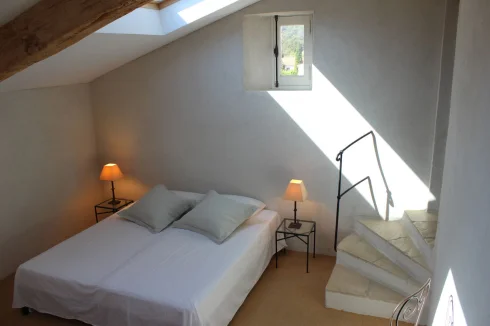 Bedroom 3 facing the garden ... Velux windows with electric blinds.