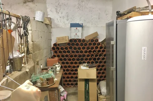 Wine corner of workshop, plus extra water heater & freezer