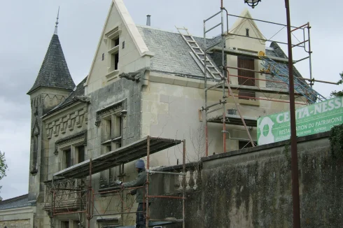 restored gable and adjoining wall