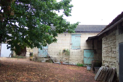 back of outbuilding and outer courtyard