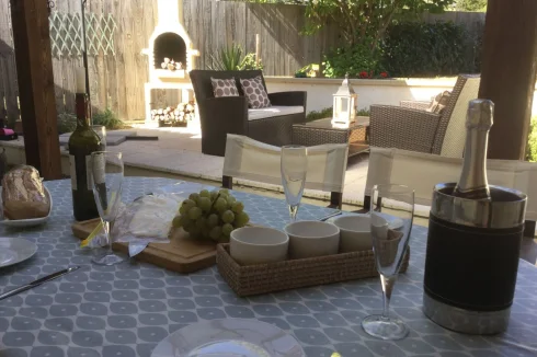 Covered terrace dining leading to outside terracem