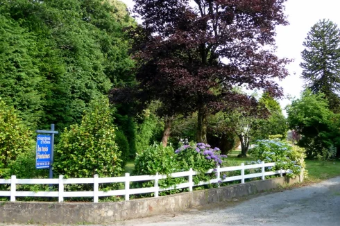 Entrance to the property with B&B sign