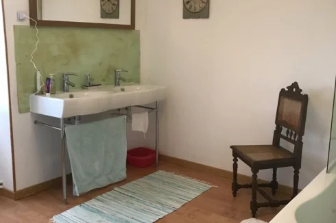 Upstairs bathroom with shower over bath