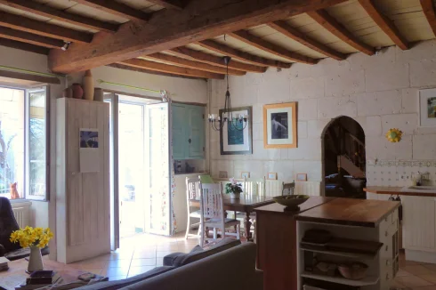 kitchen farmhouse with stone fire place, wood burner, radiators, fitted kitchen