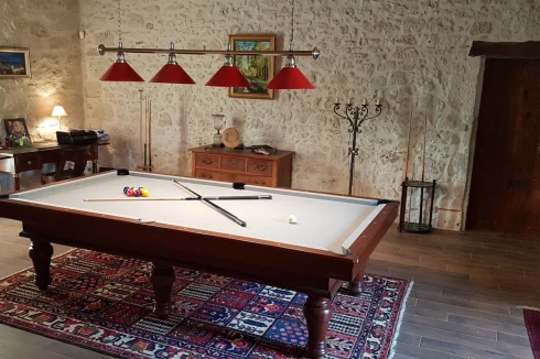 salle de billard bibliothèque lumière traversante Est-Ouest