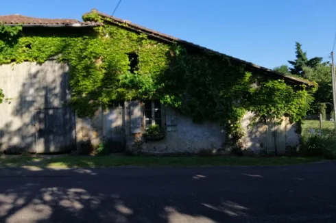 Cottage attached to barn