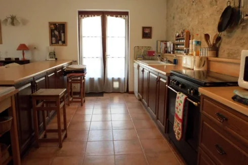 Kitchen, door to Courtyard