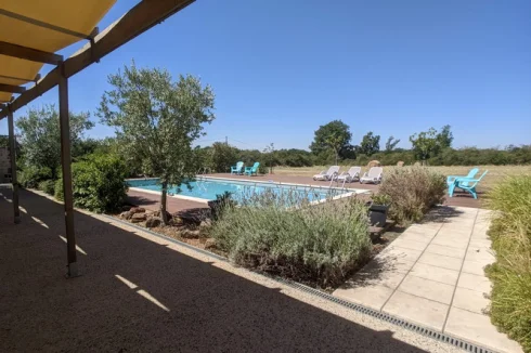 Pool from reception room covered terrace