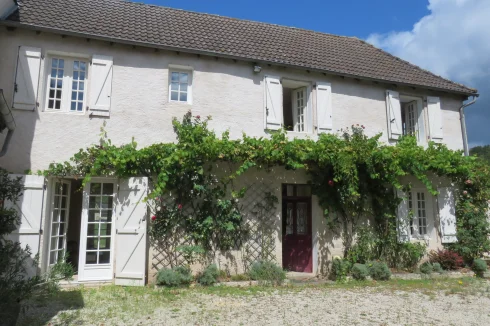 Village House with a Barn and Land