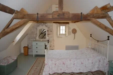 One of the guest bedrooms, bathroom adjacent