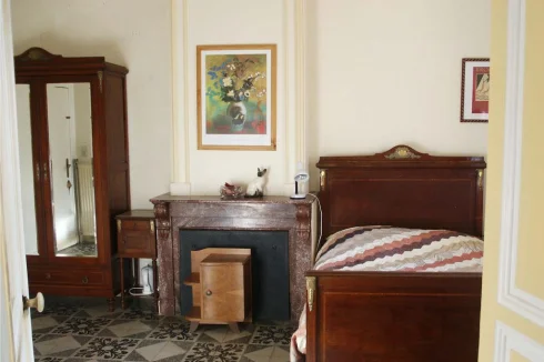 Many original features retained in the apartments  with classic French bedroom furniture