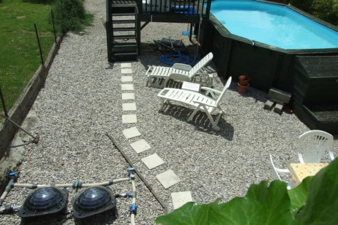 Solar heating for the pool. Easy to maintain and effective.