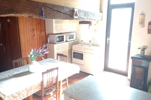 Kitchen showing log burner