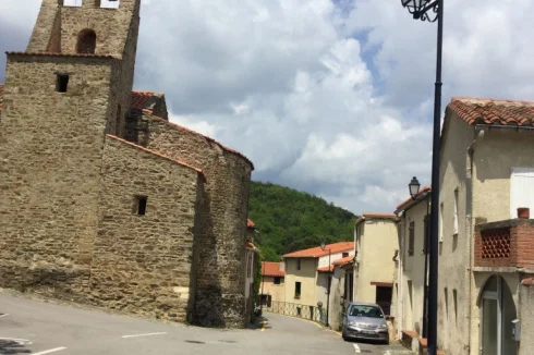 main street showing church on left and my house on right