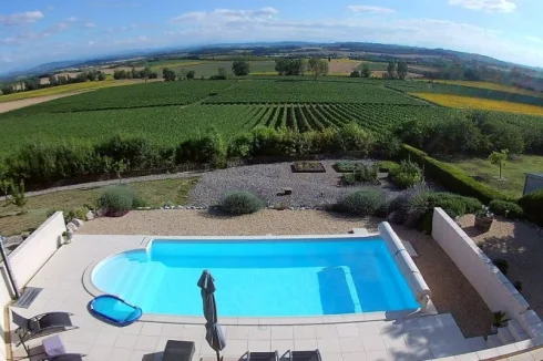 Main bedroom balcony view over vineyards and sunflowers to Pyrenees