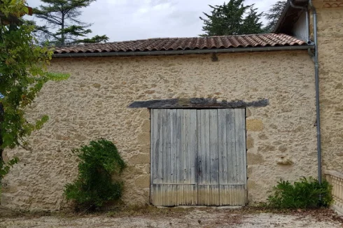 Attached barn (re-roofed)