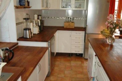 Plenty of cabinet/large drawer spaces. Lot of counter top surface with electric outlets