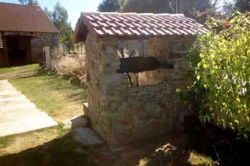 Water well in local stone w/new roof