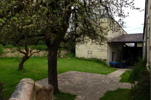 Back entrance facing the porch and the terrace