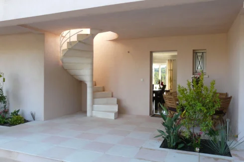 Entrance to communal kitchen and solarium