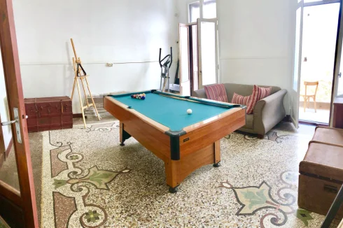 Pool Room With Mosaic Flooring, French Doors To Back Patio