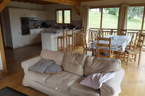 Open plan to kitchen. Oak dining table sits 10 or extends to 14