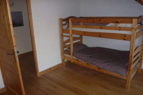 Bunks plus third single bed to left